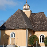 Esse kyrka (Magdalena Sofia) Esse kyrka med en blå himmel i bakgrunden